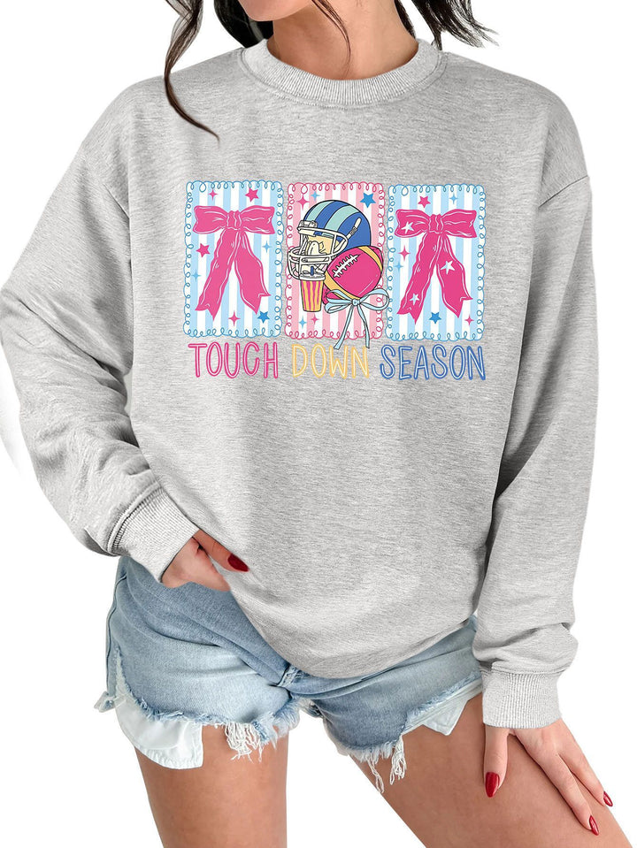 Kvinnors sweatshirt med kreativ fotbollsmotiv och avslappnad passform Mirla-Eva Jonsson
