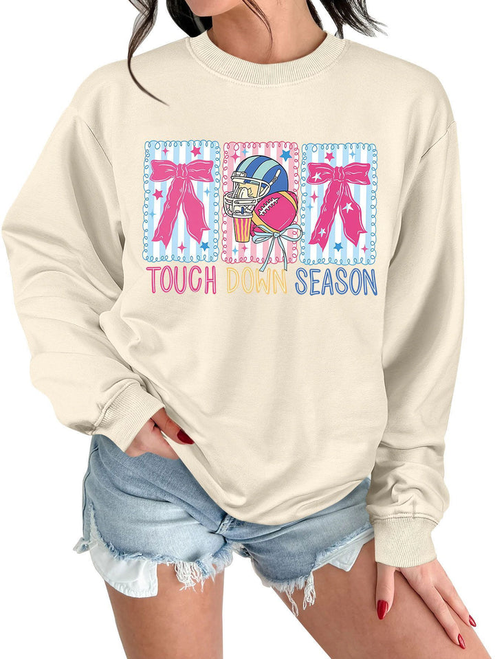 Kvinnors sweatshirt med kreativ fotbollsmotiv och avslappnad passform Mirla-Eva Jonsson