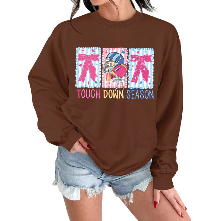 Kvinnors sweatshirt med kreativ fotbollsmotiv och avslappnad passform Mirla-Eva Jonsson