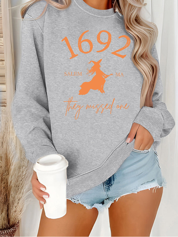 Kvinnors sweatshirt med kreativ häxdesign och bekväm passform Mirla-Eva Jonsson