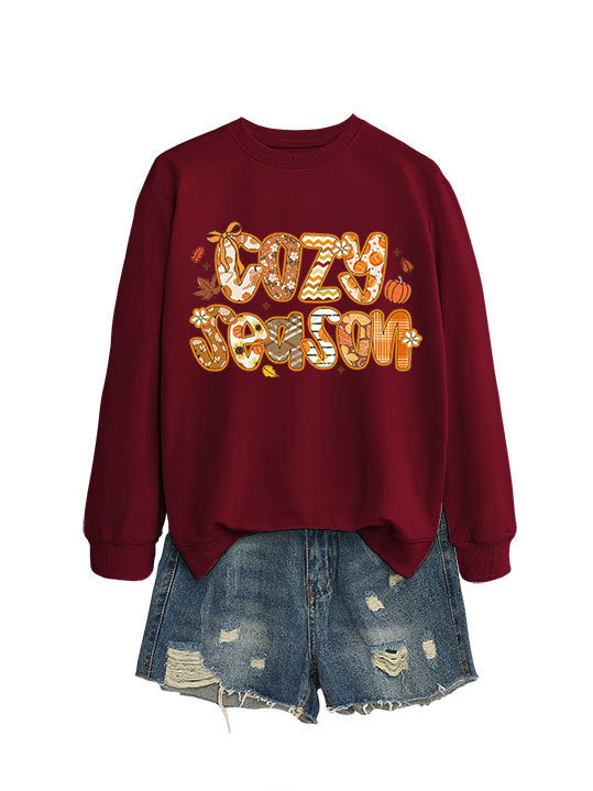 Kvinnors sweatshirt med kreativ höstdesign och avslappnad passform Mirla-Eva Jonsson