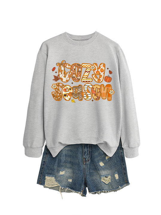 Kvinnors sweatshirt med kreativ höstdesign och avslappnad passform Mirla-Eva Jonsson