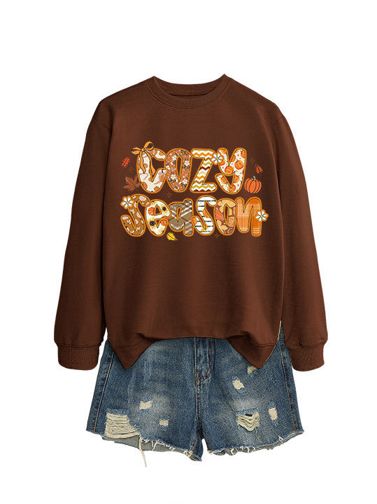 Kvinnors sweatshirt med kreativ höstdesign och avslappnad passform Mirla-Eva Jonsson