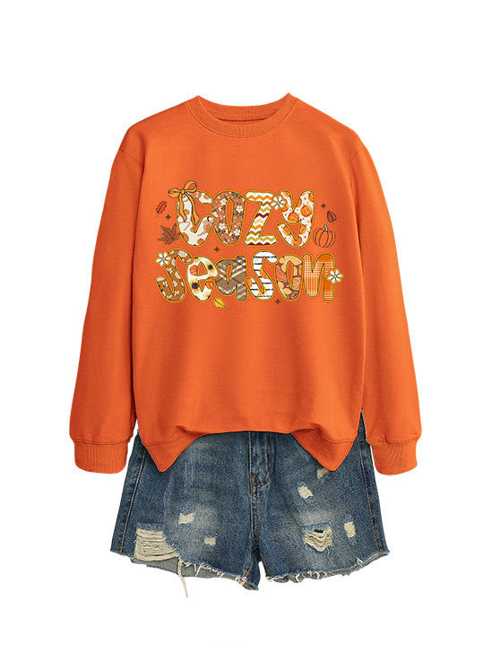 Kvinnors sweatshirt med kreativ höstdesign och avslappnad passform Mirla-Eva Jonsson