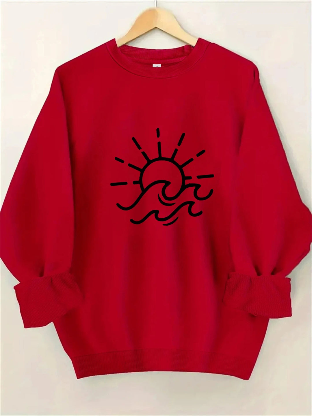 Kvinnors sweatshirt med kreativ sol- och vågmönster Mirla-Eva Jonsson