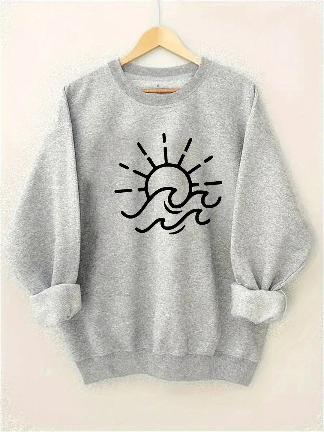 Kvinnors sweatshirt med kreativ sol- och vågmönster Mirla-Eva Jonsson