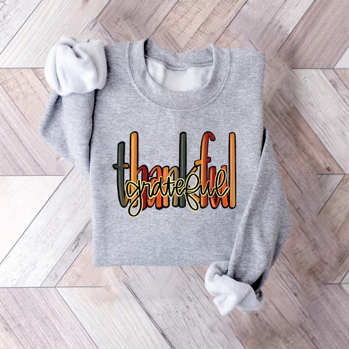 Kvinnors sweatshirt med kreativ "thankful" text och bekväm passform Mirla-Eva Jonsson