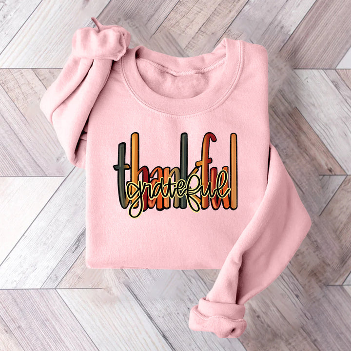 Kvinnors sweatshirt med kreativ "thankful" text och bekväm passform Mirla-Eva Jonsson
