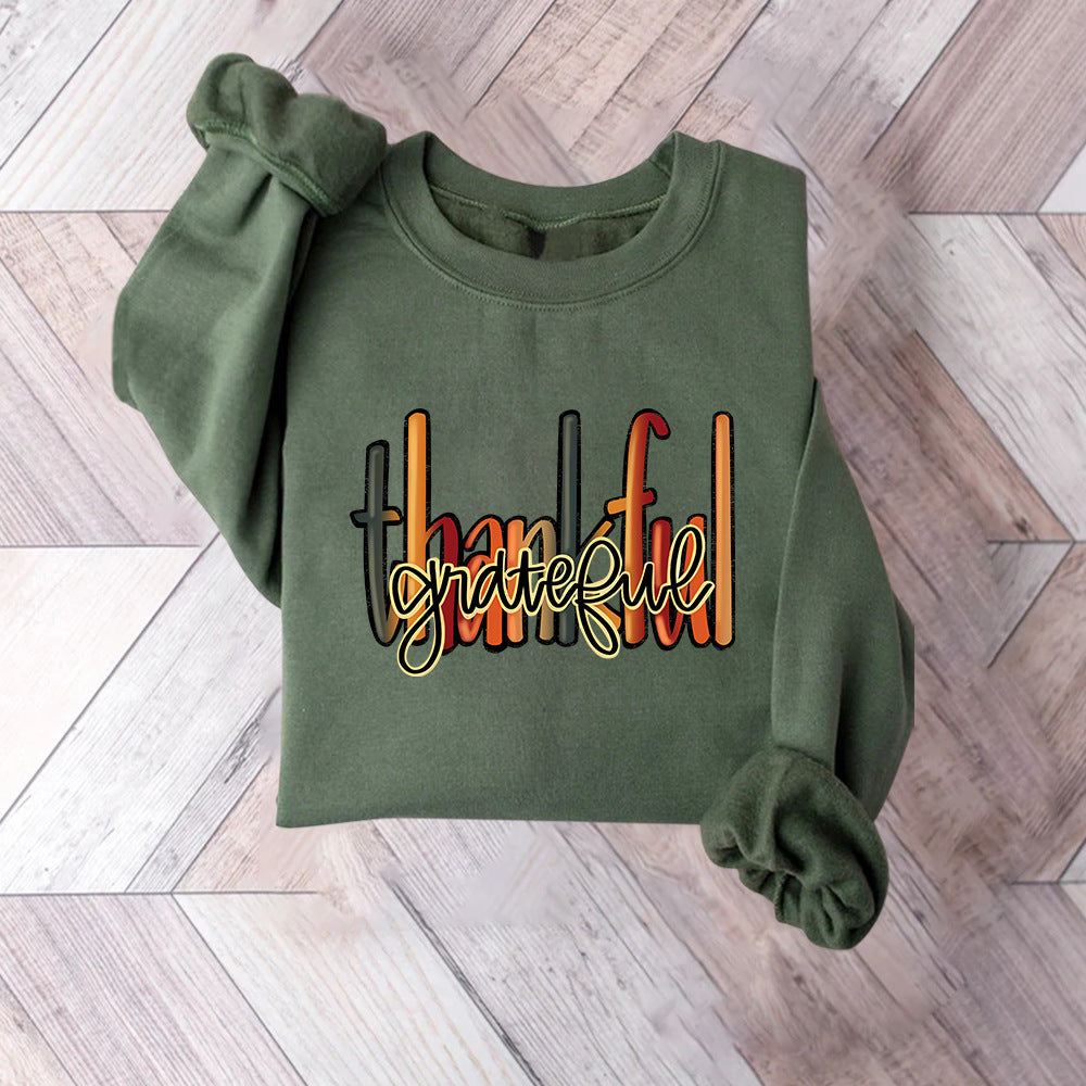 Kvinnors sweatshirt med kreativ "thankful" text och bekväm passform Mirla-Eva Jonsson