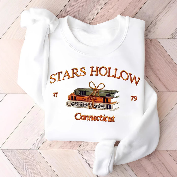 Kvinnors sweatshirt med kreativt Stars Hollow-motiv Mirla-Eva Jonsson