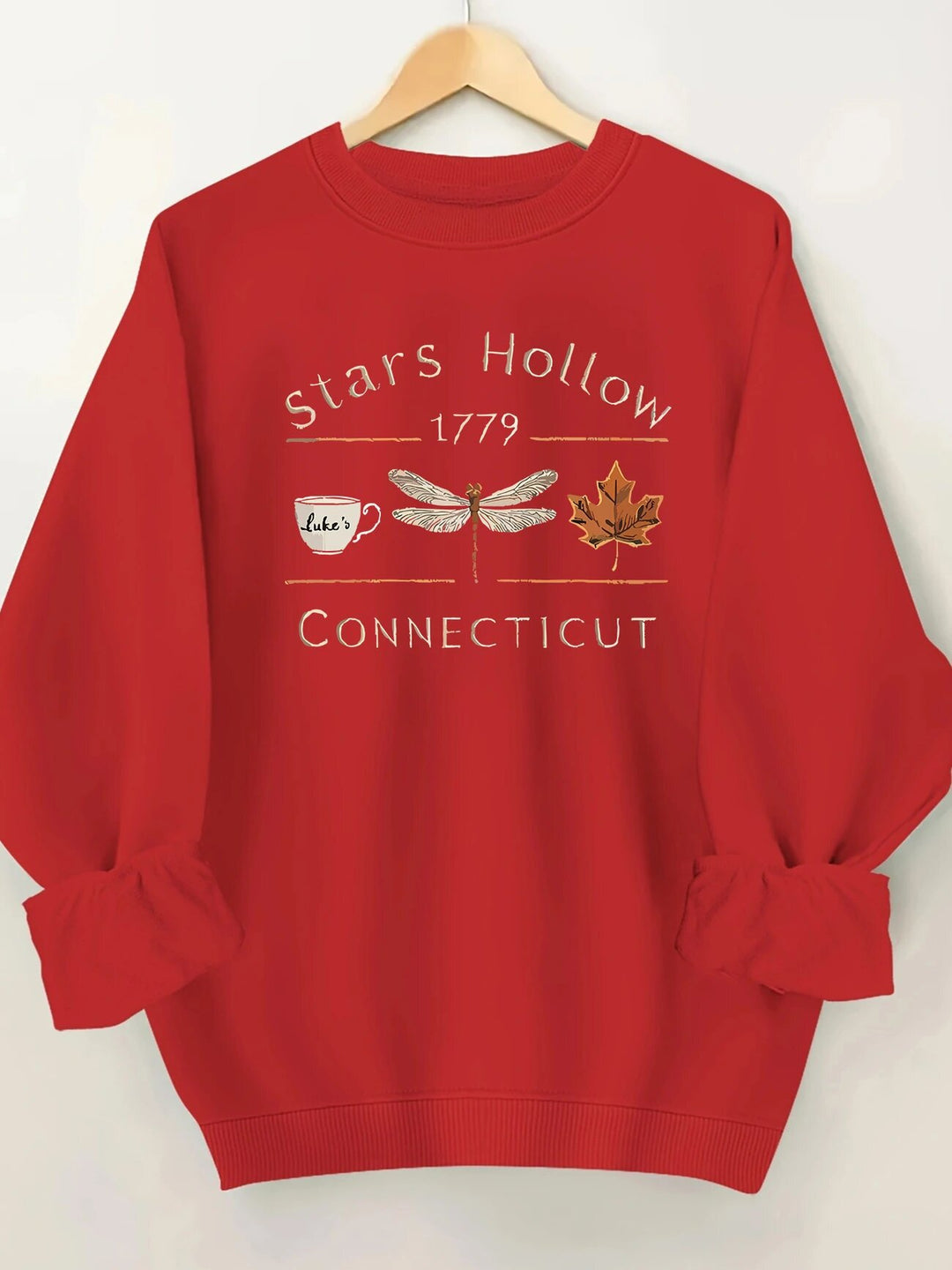 Kvinnors sweatshirt med kreativt Stars Hollow-motiv Mirla-Eva Jonsson