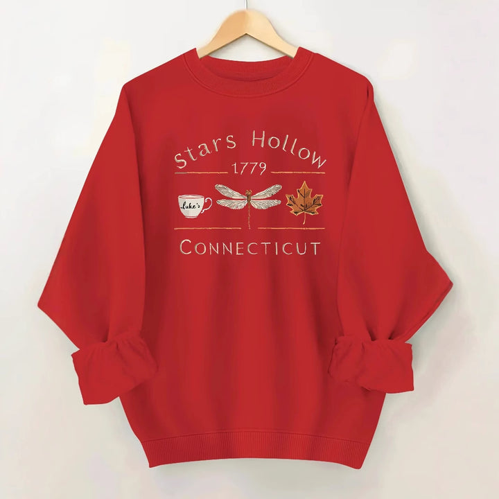 Kvinnors sweatshirt med kreativt Stars Hollow-motiv Mirla-Eva Jonsson