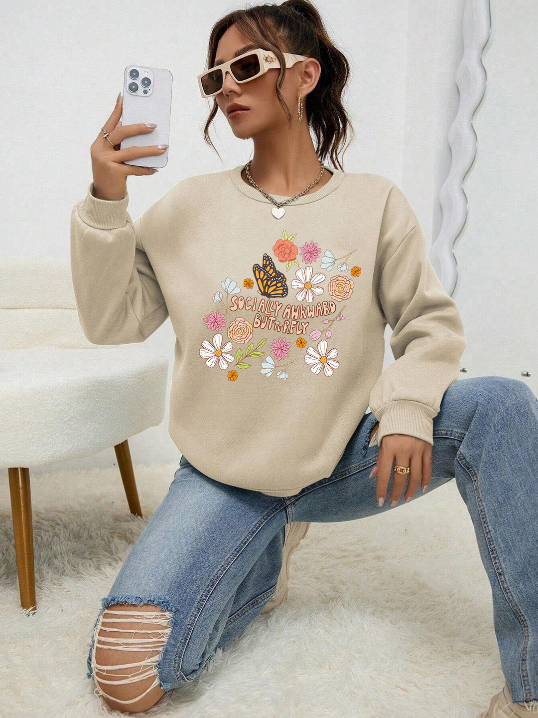 Kvinnors sweatshirt med kreativt blommönster och inspirerande tryck Mirla-Eva Jonsson