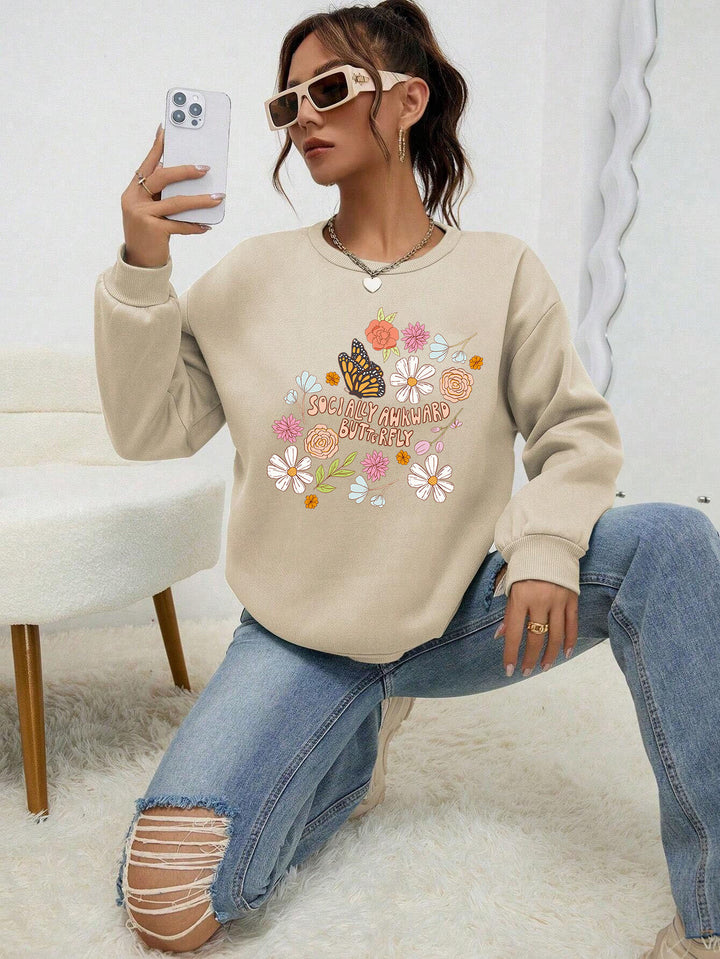 Kvinnors sweatshirt med kreativt blommönster och inspirerande tryck Mirla-Eva Jonsson