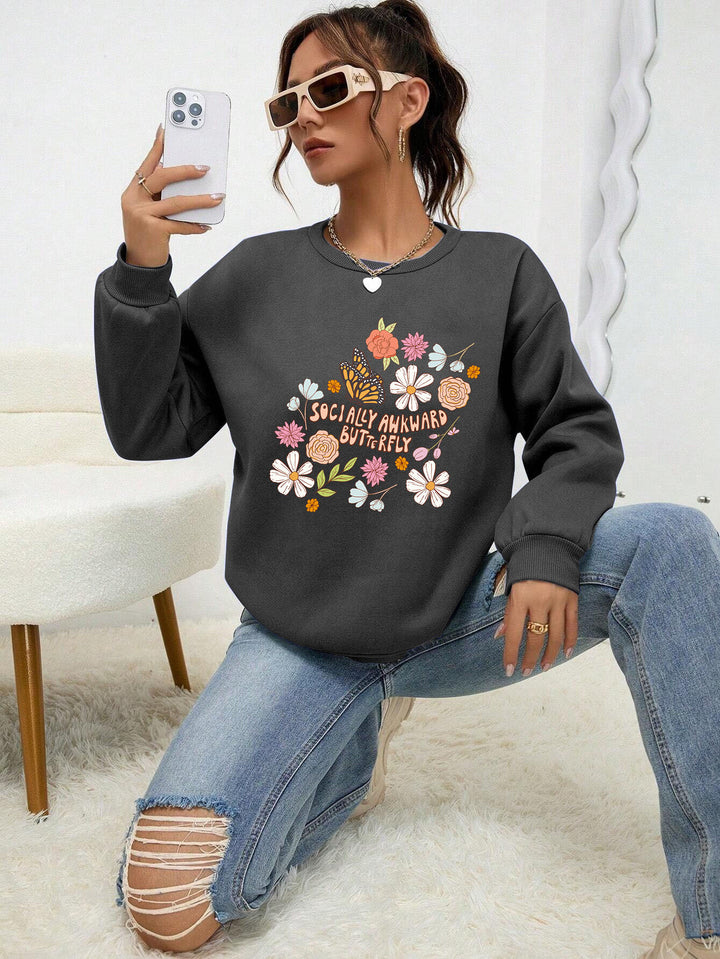 Kvinnors sweatshirt med kreativt blommönster och inspirerande tryck Mirla-Eva Jonsson