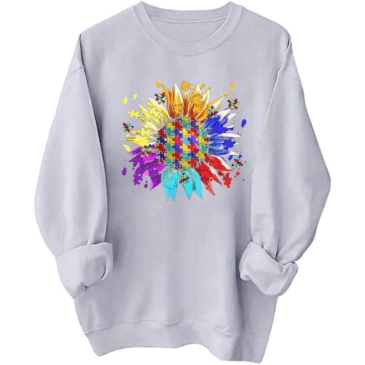 Kvinnors sweatshirt med kreativt pusselblomdesign och bekväm passform Mirla-Eva Jonsson
