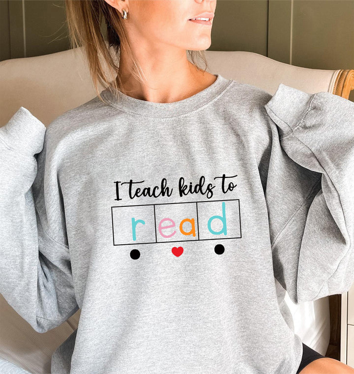 Kvinnors sweatshirt med kreativt undervisningsmotiv Mirla-Eva Jonsson