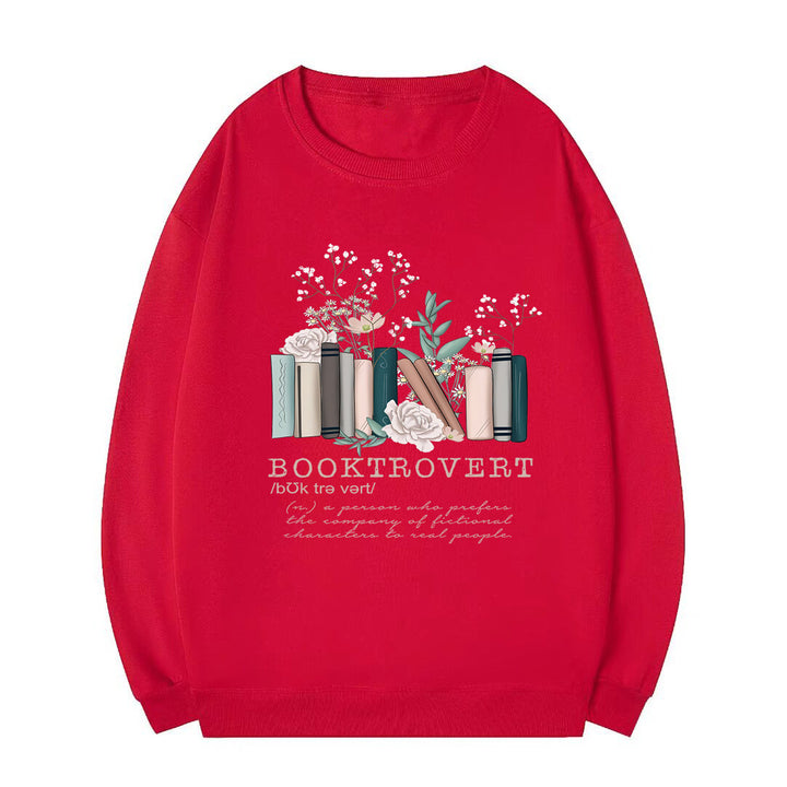 Kvinnors sweatshirt med lekfull bokdesign och inspirerande text Mirla-Eva Jonsson