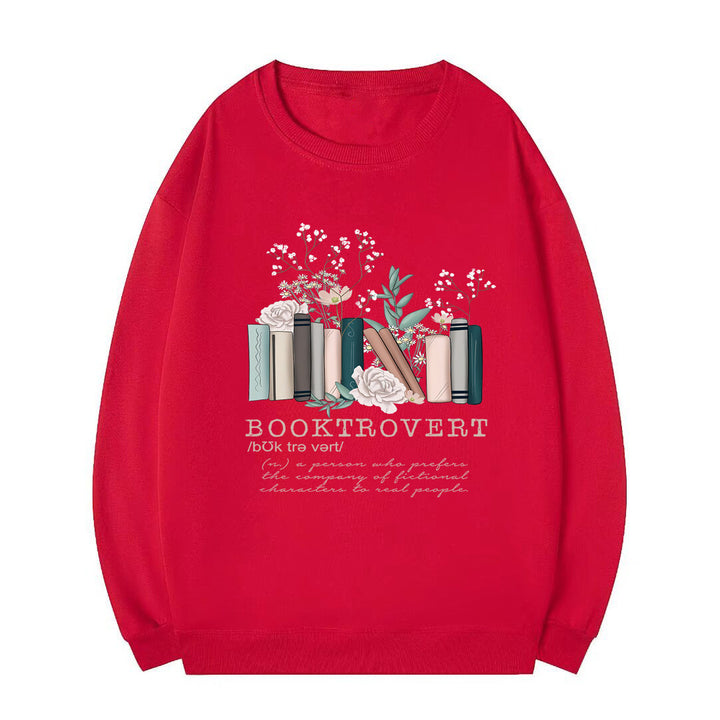 Kvinnors sweatshirt med lekfull bokdesign och inspirerande text Mirla-Eva Jonsson