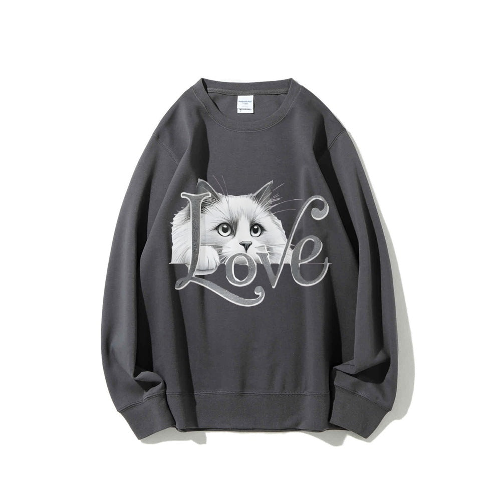 Kvinnors sweatshirt med lekfull kattdesign och avslappnad passform Mirla-Eva Jonsson