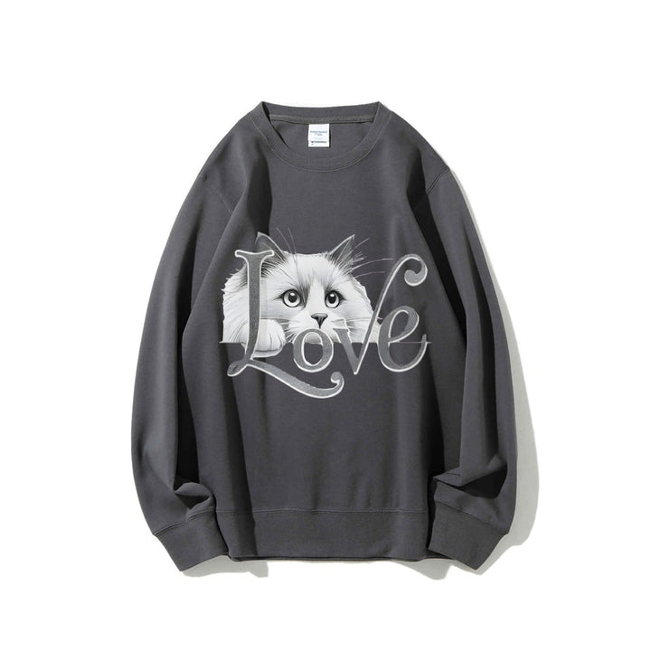 Kvinnors sweatshirt med lekfull kattdesign och avslappnad passform Mirla-Eva Jonsson