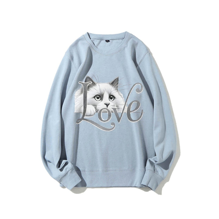 Kvinnors sweatshirt med lekfull kattdesign och avslappnad passform Mirla-Eva Jonsson