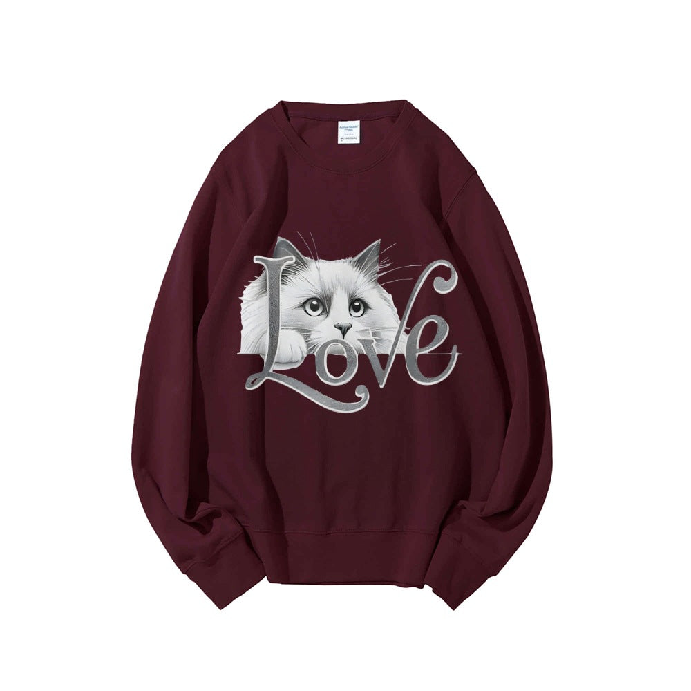 Kvinnors sweatshirt med lekfull kattdesign och avslappnad passform Mirla-Eva Jonsson