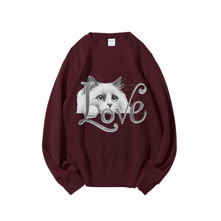 Kvinnors sweatshirt med lekfull kattdesign och avslappnad passform Mirla-Eva Jonsson