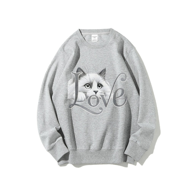 Kvinnors sweatshirt med lekfull kattdesign och avslappnad passform Mirla-Eva Jonsson