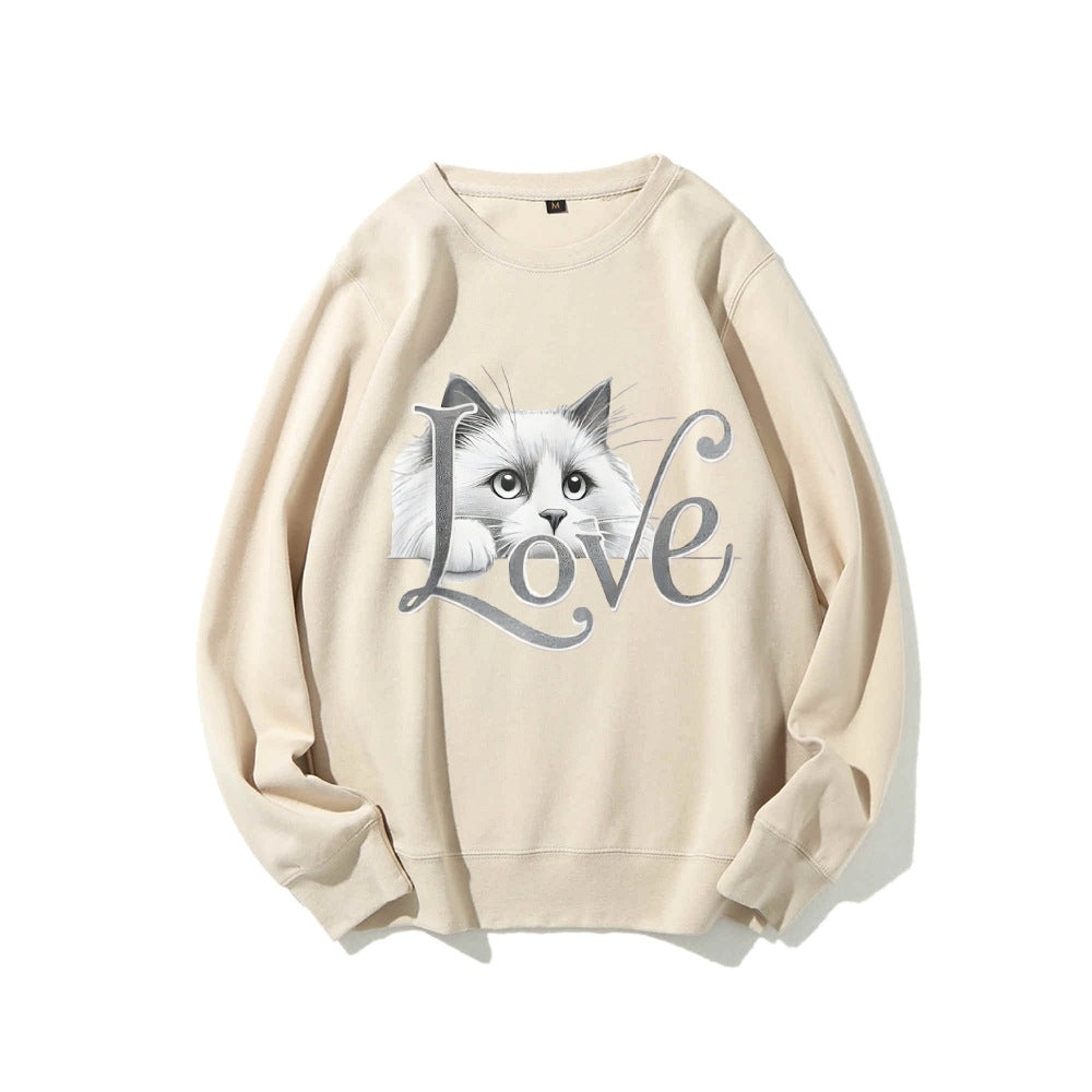 Kvinnors sweatshirt med lekfull kattdesign och avslappnad passform Mirla-Eva Jonsson