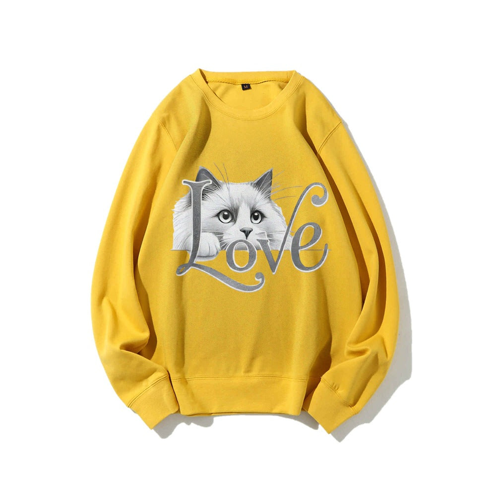 Kvinnors sweatshirt med lekfull kattdesign och avslappnad passform Mirla-Eva Jonsson