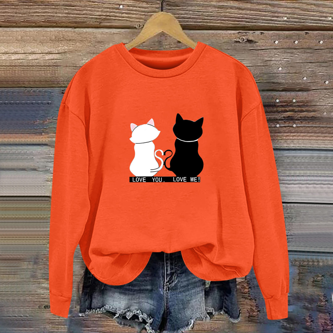 Kvinnors sweatshirt med lekfull kattdesign och humoristisktryck Mirla-Eva Jonsson