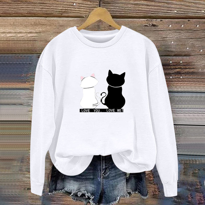 Kvinnors sweatshirt med lekfull kattdesign och humoristisktryck Mirla-Eva Jonsson