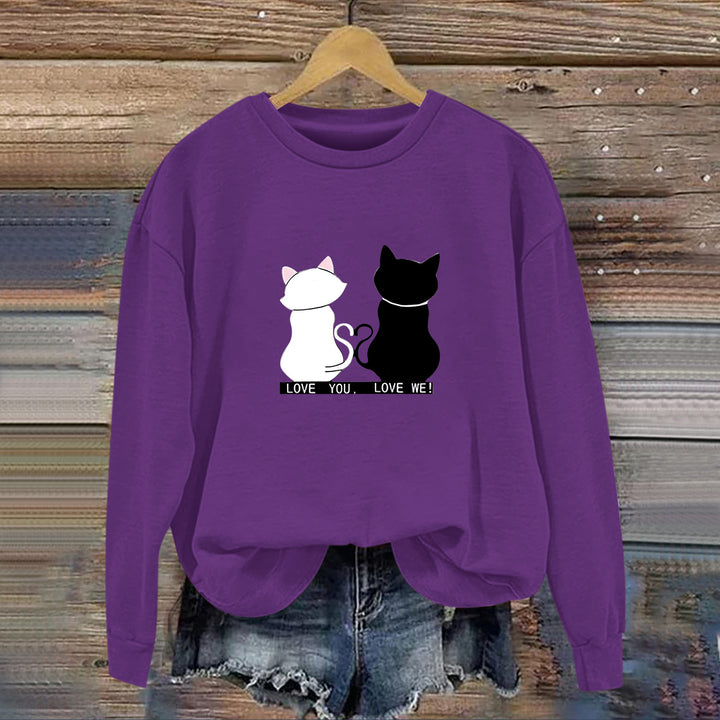 Kvinnors sweatshirt med lekfull kattdesign och humoristisktryck Mirla-Eva Jonsson
