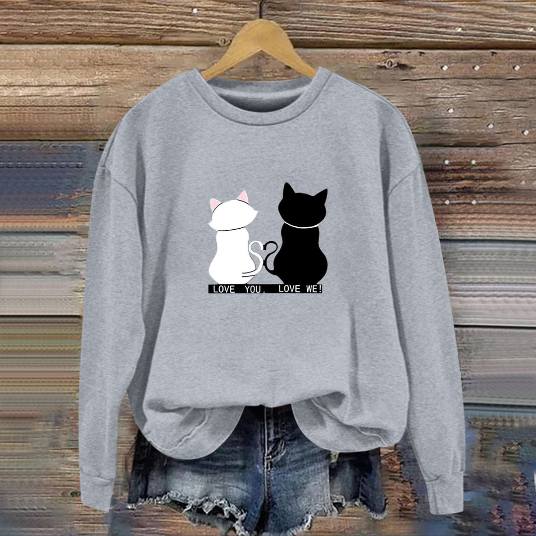 Kvinnors sweatshirt med lekfull kattdesign och humoristisktryck Mirla-Eva Jonsson