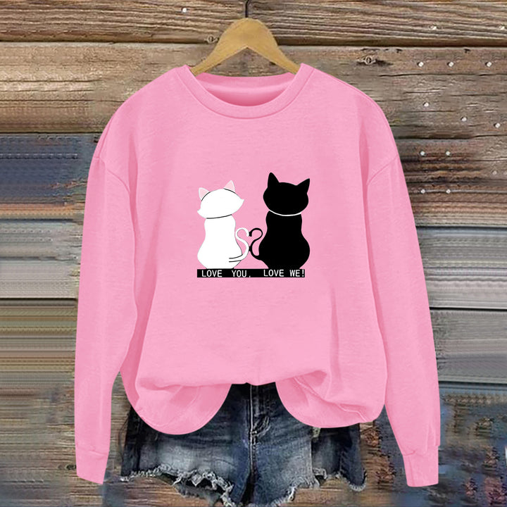 Kvinnors sweatshirt med lekfull kattdesign och humoristisktryck Mirla-Eva Jonsson