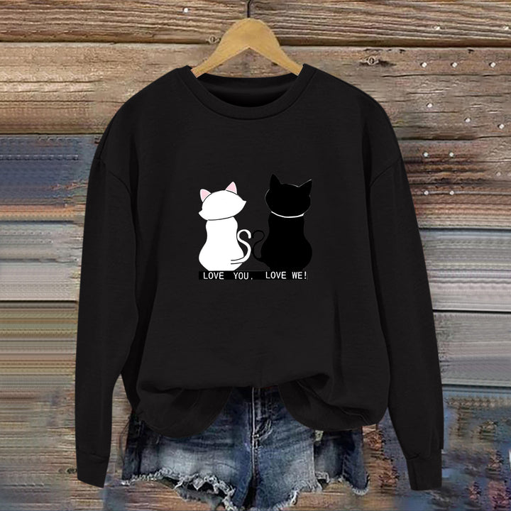 Kvinnors sweatshirt med lekfull kattdesign och humoristisktryck Mirla-Eva Jonsson