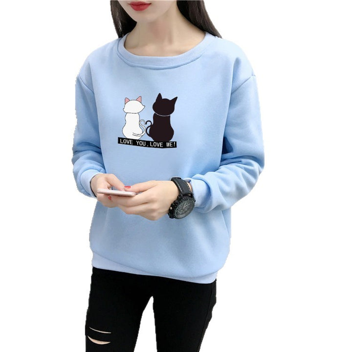 Kvinnors sweatshirt med lekfull kattdesign och humoristisktryck Mirla-Eva Jonsson