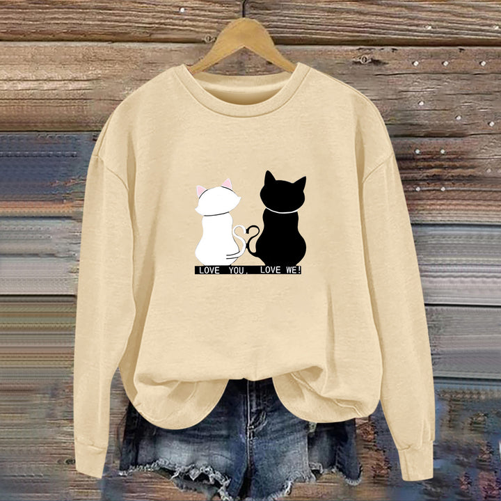 Kvinnors sweatshirt med lekfull kattdesign och humoristisktryck Mirla-Eva Jonsson