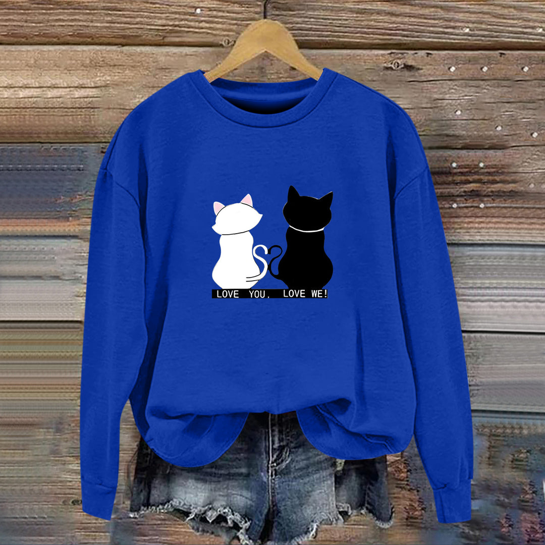Kvinnors sweatshirt med lekfull kattdesign och humoristisktryck Mirla-Eva Jonsson