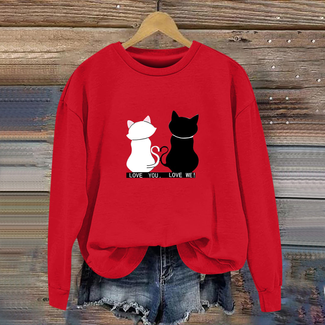 Kvinnors sweatshirt med lekfull kattdesign och humoristisktryck Mirla-Eva Jonsson