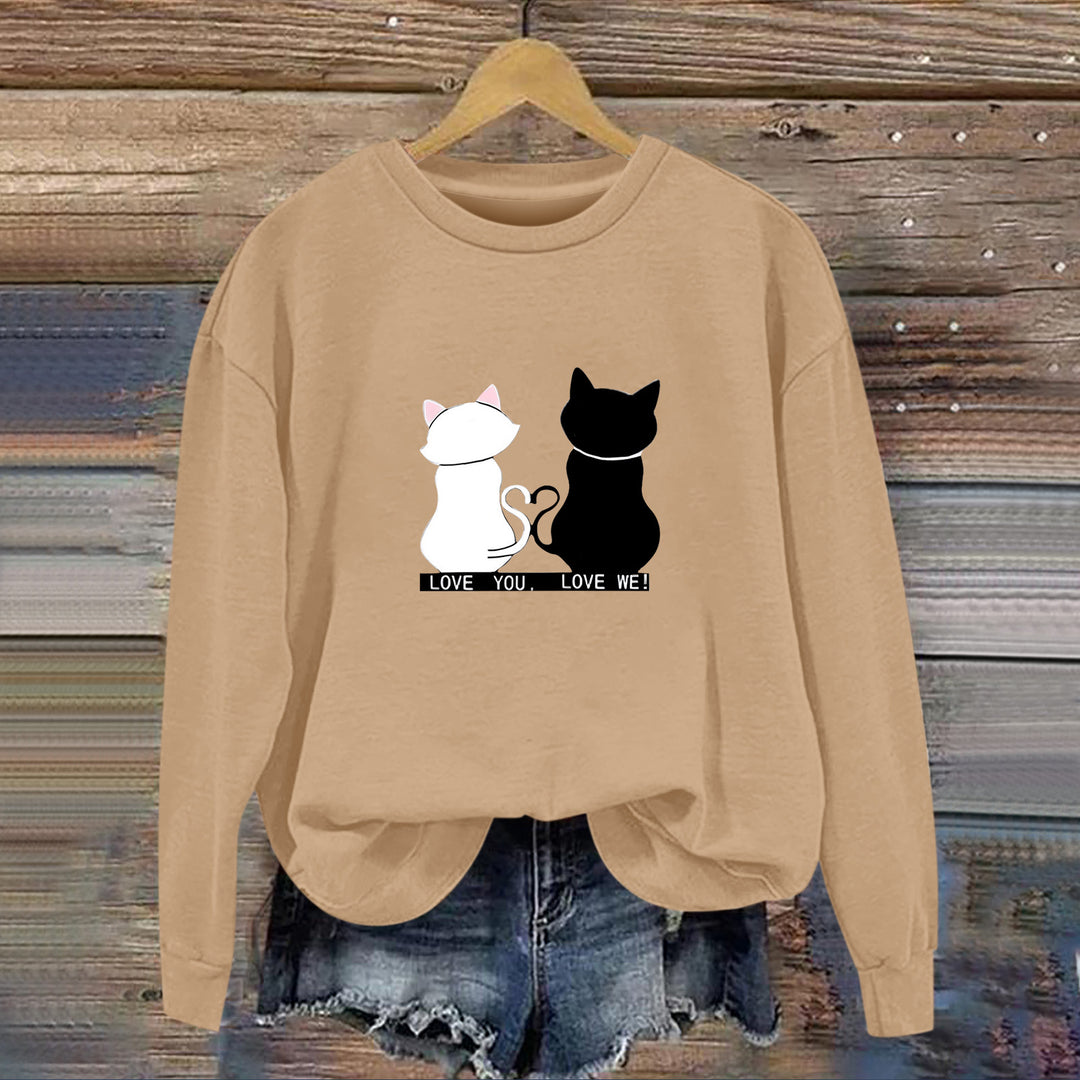Kvinnors sweatshirt med lekfull kattdesign och humoristisktryck Mirla-Eva Jonsson