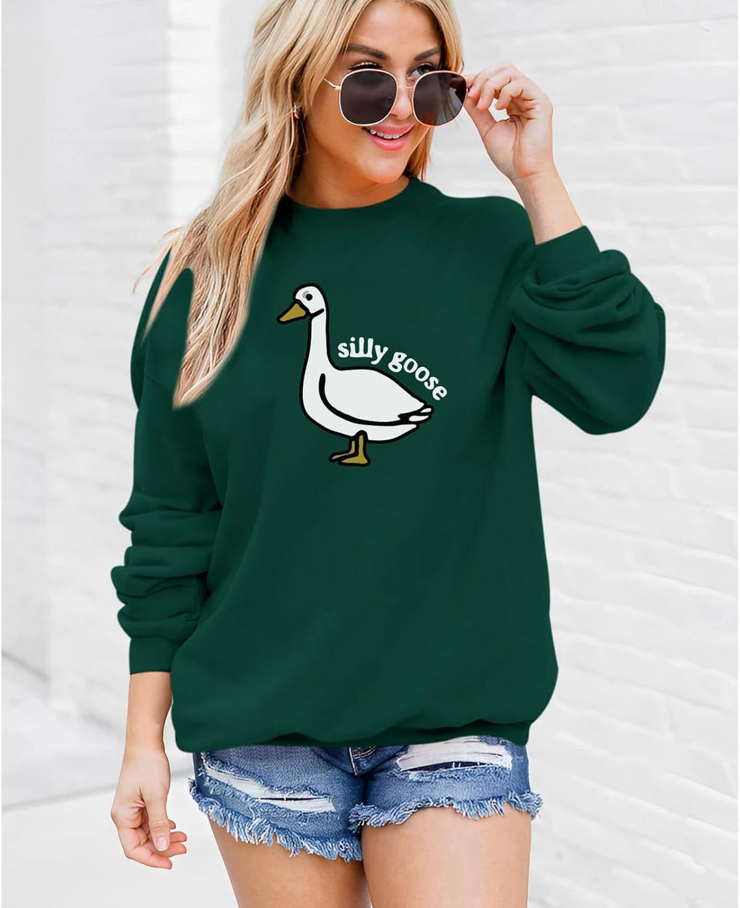 Kvinnors sweatshirt med lekfullt hotmot och avslappnad passform Mirla-Eva Jonsson