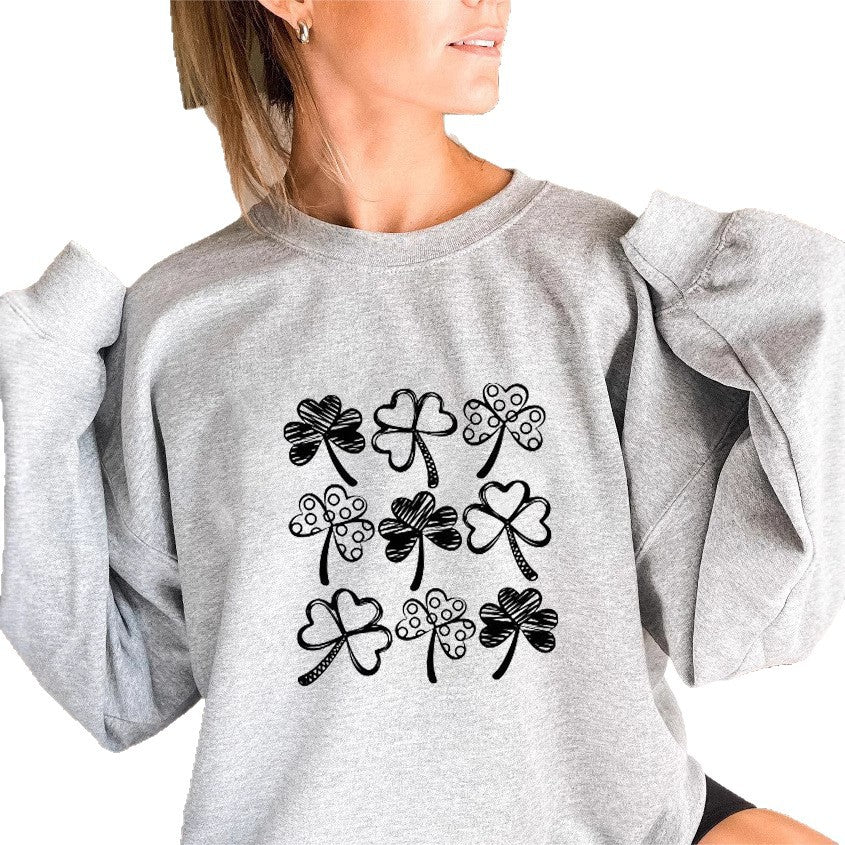 Kvinnors sweatshirt med lekfullt klövermönster Mirla-Eva Jonsson