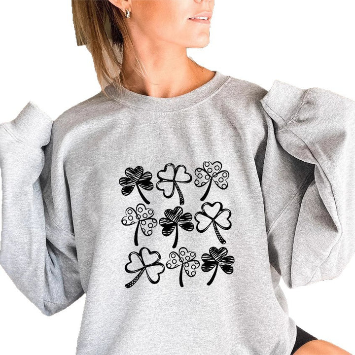 Kvinnors sweatshirt med lekfullt klövermönster Mirla-Eva Jonsson