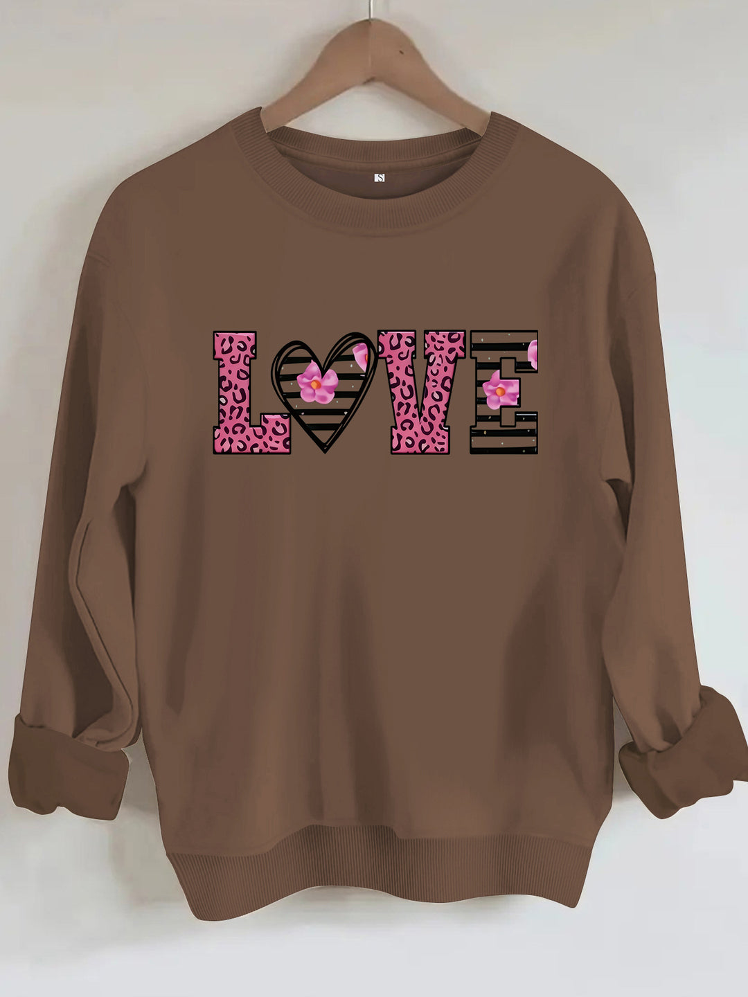 Kvinnors sweatshirt med modernt leopardhjärtadesign och bekväm passform Mirla-Eva Jonsson