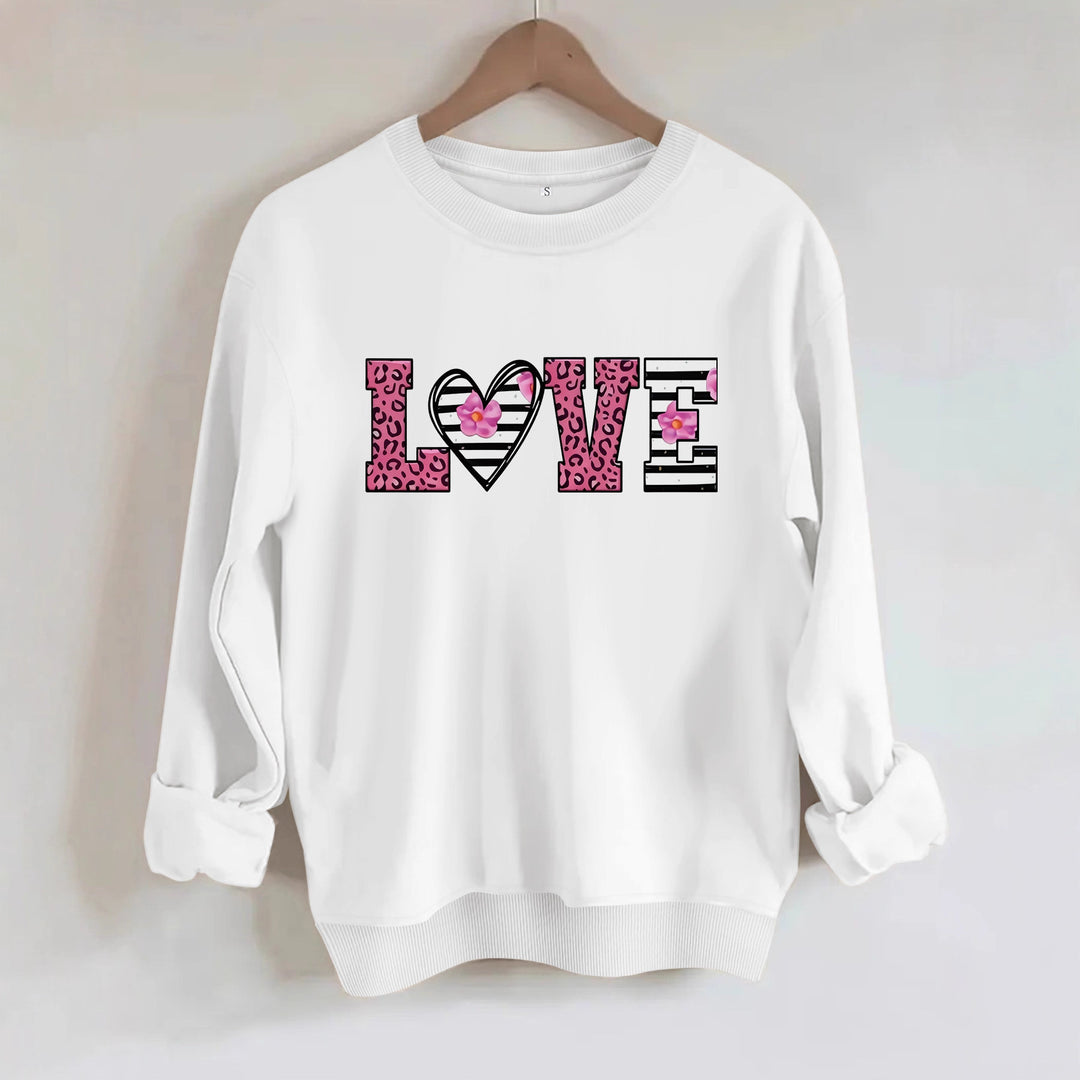 Kvinnors sweatshirt med modernt leopardhjärtadesign och bekväm passform Mirla-Eva Jonsson