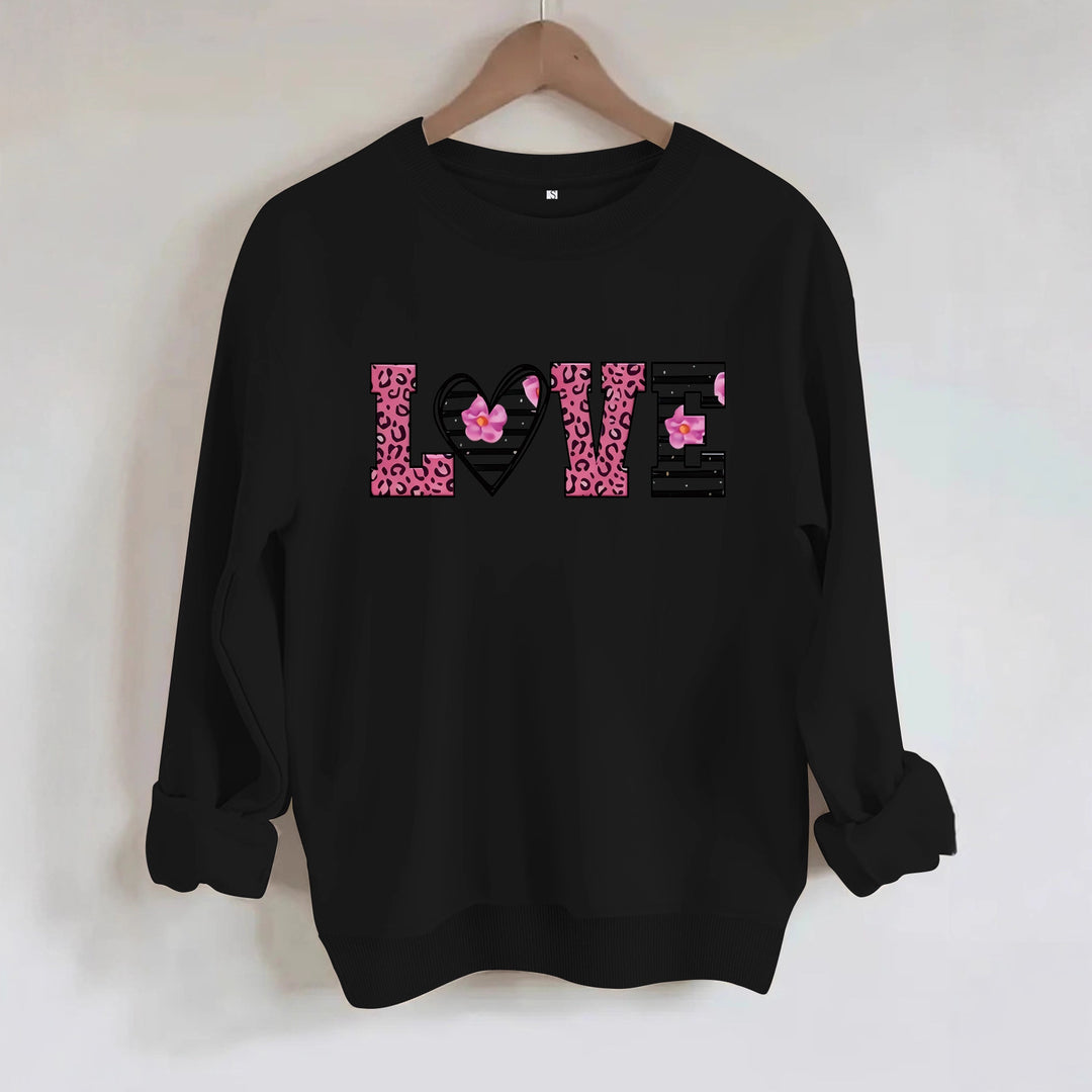 Kvinnors sweatshirt med modernt leopardhjärtadesign och bekväm passform Mirla-Eva Jonsson