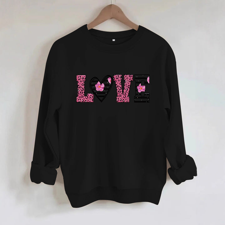 Kvinnors sweatshirt med modernt leopardhjärtadesign och bekväm passform Mirla-Eva Jonsson