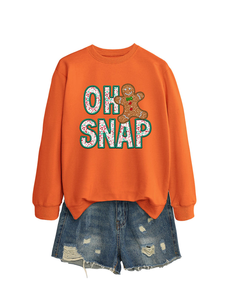 Kvinnors sweatshirt med roligt pepparkakeman motiv och glittrande bokstäver Mirla-Eva Jonsson